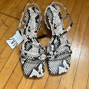 Snakeskin print heels